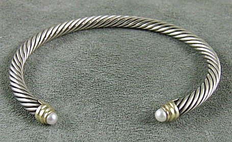 David Yurman bangle bracelet 18K & sterling silver: David Yurman bangle bracelet 18K & sterling silver, pearl ends, 2 7/8" wide, 27.4 grams.