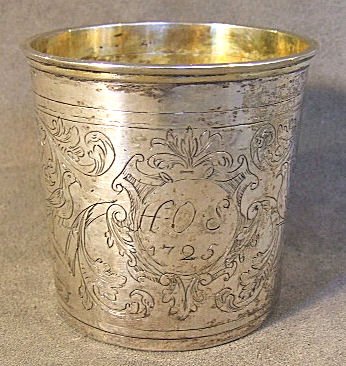 18th C. Continental sterling silver engraved beake: 18th C. Continental sterling silver engraved beaker with gold washed interior. Monogrammed "HOS 1725". Hallmarked with date of 1720. 2.75"H, 3"W.