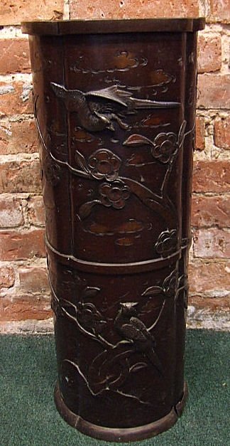 19th. C. Asian bronze umbrella stand, relief decor: 19th. C. Asian bronze umbrella stand, relief decoration of birds and trees. 23.75" H., 9.5" dia.