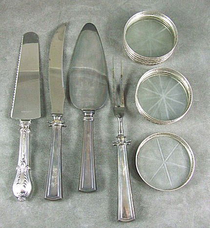 Sterling silver lot - Dominick & Haff pie server a: Sterling silver lot - Dominick & Haff pie server and carving set with 10.5" knife, monogrammed along with sterling silver cake knife and 8 sterling and glass 3" coasters.