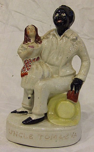 Staffordshire figurine, Uncle Tom & Eva. 8.25" hig: Staffordshire figurine, Uncle Tom & Eva. 8.25" high, all over crazing, Eva's head broken off and glued back in place.