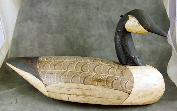 Canada Goose decoy from South River Annapolis, MD.: Canada Goose decoy from South River Annapolis, MD. Area, original paint with minimal wear, head connected to neck with nail. 18.5" long, 10" high.