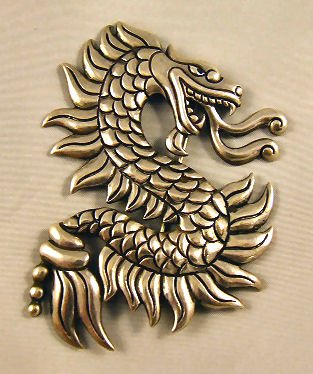 Sterling silver Mexican dragon brooch marked "365 Lo: Sterling silver Mexican dragon brooch marked "365 Los Castillo 980 Taxco Made in Mexico" 3.5" H., 3" W. .97 troy oz.