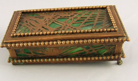 Tiffany Studios Pinecone pattern stamp box, glass i: Tiffany Studios Pinecone pattern stamp box, glass in excellent condition, two ball feet missing, 4.25" X 2.5"