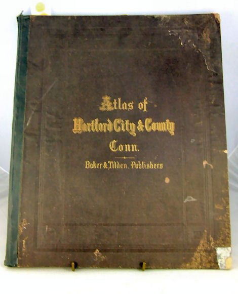 Atlas of Hartford City & County, Baker & Tilden Pub: Atlas of Hartford City & County, Baker & Tilden Publishers, 1869, some foxing and soiling, cover warped and stained, some larger folded maps are torn at creases 15" X 18". Hand colored.