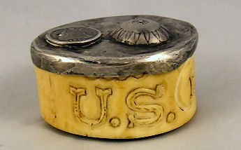 Buffalo horn snuff box carved with stars, U.S. shi: Buffalo horn snuff box carved with stars, U.S. shield and the date "1843". Silver cap with Navajo button and 1845 Liberty standing dime. An unusual box most probably made when U.S. troops were sent to
