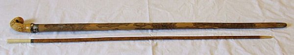 2 19th. C. canes / walking sticks, one with ornate: 2 19th. C. canes / walking sticks, one with ornately carved handle and tortoise tip in excellent condition 37", walking stick with bone handle and tip, 34.25".