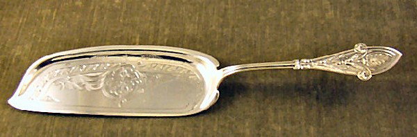 Tiffany & Co. Makers sterling silver Italian patter: Tiffany & Co. Makers sterling silver Italian pattern crumber, 13.25" long, monogrammed "SA" on back of handle, 5.34 troy ounces.