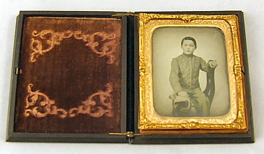 Ambrotype in Kinsley & Parker gutta percha case of: Ambrotype in Kinsley & Parker gutta percha case of young cadet in Civil War era uniform. Case measures 3.25" X 4", chip on one corner and chip by hinge on two sides.