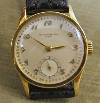 18k yellow gold Patek Philippe & Co Geneve, men's w: 18k yellow gold Patek Philippe & Co Geneve, men's wristwatch, restored and cleaned, works, marked 0.750, 18 jewels #296702