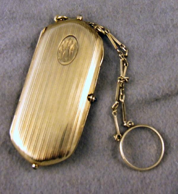 14k Dreicer Co. yellow gold compact w/ sapphire ca: 14k Dreicer Co. yellow gold compact w/ sapphire cabochon buttons. Case is 3" long. 42.4 grams