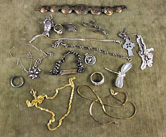 Lot of sterling silver jewelry including chains, b: Lot of sterling silver jewelry including chains, bracelets, pins, rings and Australian 1940's coin bracelet silver content unknown. 3.77 troy ounces total