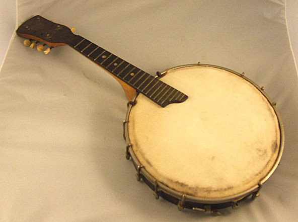 Estate banjo, no maker mark, sold "as is", 23.5" l: Estate banjo, no maker mark, sold "as is", 23.5" long, head 10.5" diameter.