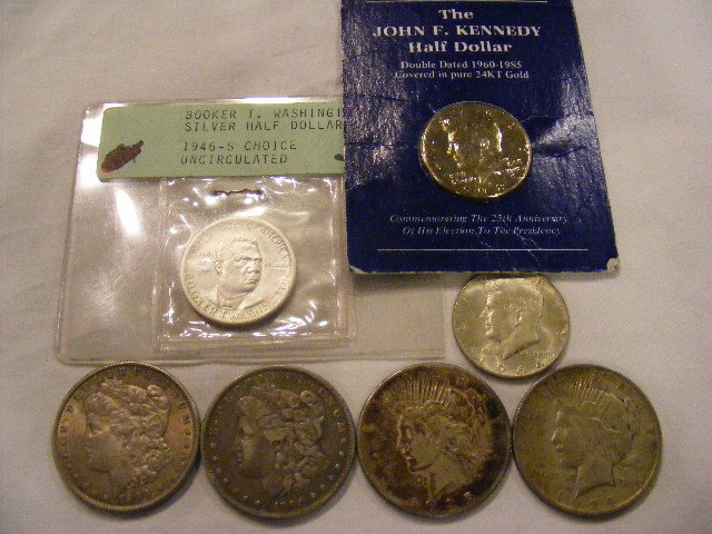U.S. silver coin lot. 1896 & 1900 Morgan dollars, 1: U.S. silver coin lot. 1896 & 1900 Morgan dollars, 1924 & 1925 Peace dollars, 1946-S uncirculated Booker T. Washington 1/2 dollar, 1964 Kennedy 1/2 dollar & 1985 gold plated Kennedy 1/2 dollar