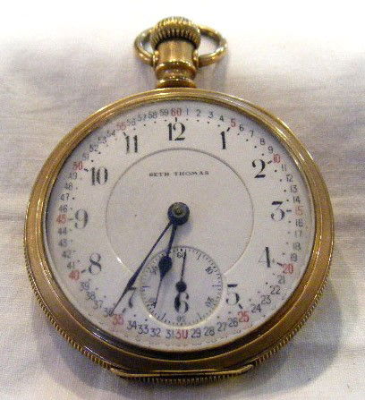 Seth Thomas pocket watch, engraved case, Fahys Mant: Seth Thomas pocket watch, engraved case, Fahys Mantauk. Damage to works, signed Seth Thomas Thomaston Conn. 69354. Worn gold filled case, scratches on crystal - no chips, clean face, no cracks.