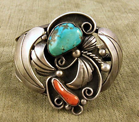 Native American silver bracelet set with turquoise: Native American silver bracelet set with turquoise and coral stones, maker mark on back, 2 1/8" widest,