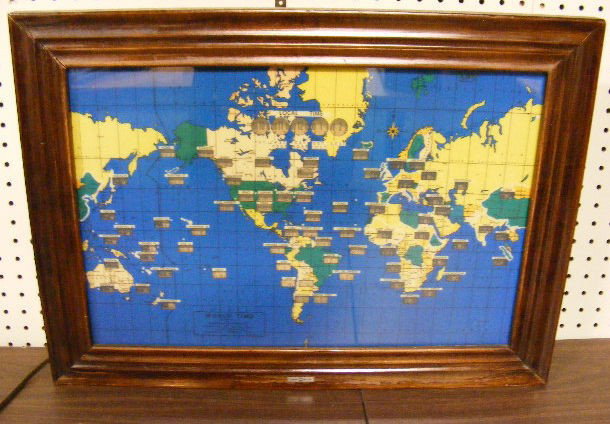 Howard Miller clock Co. World Time light up clock,: Howard Miller clock Co. World Time light up clock, in working order. Measures 24" x 17.5".