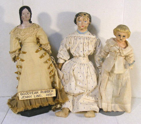 3 doll lot, 14.5" Goodyear Rubber Jenny Lind doll, : 3 doll lot, 14.5" Goodyear Rubber Jenny Lind doll, cloth body with kid hands, crazed head, 13" wax doll with cloth body, damaged hands, soiling and wax crazing, and 17" Darrow rawhide doll with flakin