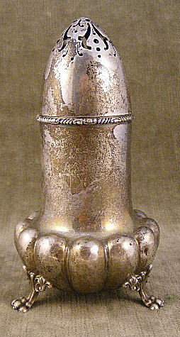 J.E. Caldwell sterling silver footed sugar shaker,: J.E. Caldwell sterling silver footed sugar shaker, some dings on melon ribs, 5.75" high, 5.12 troy ounces, monogrammed with "D"
