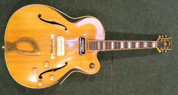 1950's Guild jazz guitar, maple body w/ case. Repl: 1950's Guild jazz guitar, maple body w/ case. Replaced pick-up, 3 screws in body, as is.