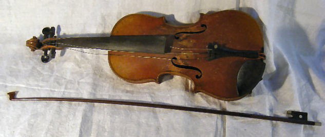 Violin & bow (unsigned bow), w/ case. The violin i: Violin & bow (unsigned bow), w/ case. The violin is pencil signed at the lower interior of body. Hartford Conn.