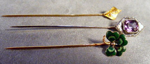 Lot of 3 14K gold stickpins, enameled four leaf cl: Lot of 3 14K gold stickpins, enameled four leaf clover, calla lily with diamond and white gold pin set with amethyst, 3.5 gr. Total