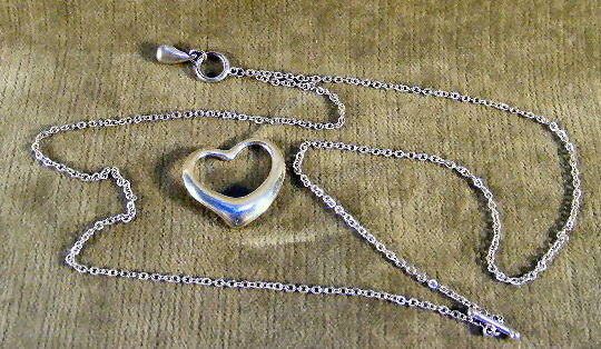 Tiffany, open heart pendant by Elsa Peretti, sterl: Tiffany, open heart pendant by Elsa Peretti, sterling silver on a 16" double strand chain with dog bone clasp and teardrop counter weight. Chain is not marked.