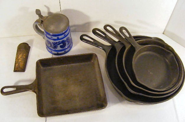 Lot of 2 Griswold skillets, No. 8 & 2106 square, u: Lot of 2 Griswold skillets, No. 8 & 2106 square, unmarked 9" skillet, Wagner 3 & 5, tin nutmeg grater and Merkelbach stein.