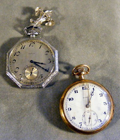 2 vintage pocket watches. Silver colored Elgin w/: 2 vintage pocket watches. Silver colored Elgin w/ etched case & Van Dell gold filled watch brooch, 17 jewels, good condition, runs. Illinois 19 jewel gold filled pocket watch, cracked crystal, winds b