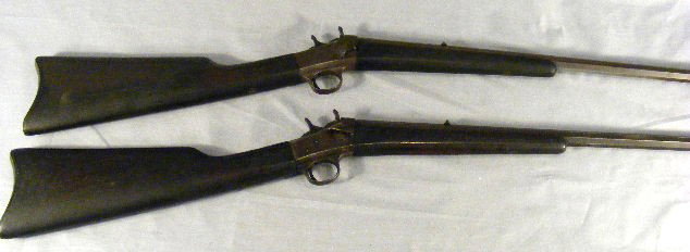 2 antique rifles, Remington Arms Co. Ilion, Ny. U: 2 antique rifles, Remington Arms Co. Ilion, Ny. USA, 37" long, octagon barrels, brown finish on metal, 1 has cracked stock and finish wear on barrel edges.