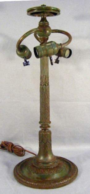 Tiffany Studios bronze lamp base # 655, excellent: Tiffany Studios bronze lamp base # 655, excellent condition, minimal wear to patina, measures 20.25" high, base is 8.25" in dia, 3.5" fitter.