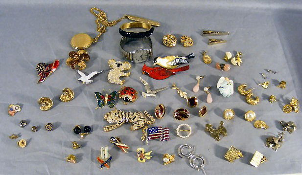 Lot of costume jewelry, two watches, enameled bir: Lot of costume jewelry, two watches, enameled birds, bracelets, leopard & koala pin, earrings, fraternal pins, Gloria Vanderbilt floral pin.