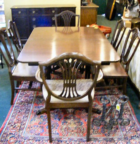 Mahogany dining room set, table w/ leaf, sideboar: Mahogany dining room set, table w/ leaf, sideboard & 6 chairs.