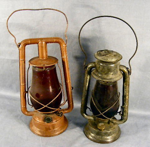 2 oil lanterns, Dietz Monarch lantern w/ red glob: 2 oil lanterns, Dietz Monarch lantern w/ red globe (repainted), Rayo #124 w/ red shade.