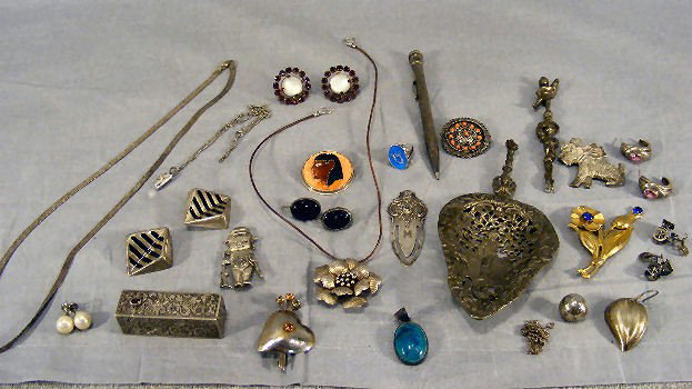 Lot of misc. sterling silver including engraved l: Lot of misc. sterling silver including engraved lipstick case, earrings, pins, chains, bookmark, etc. total weight with stones approx. 7 troy ozs. And broken European 800 silver spoon weighing 4.2 tro