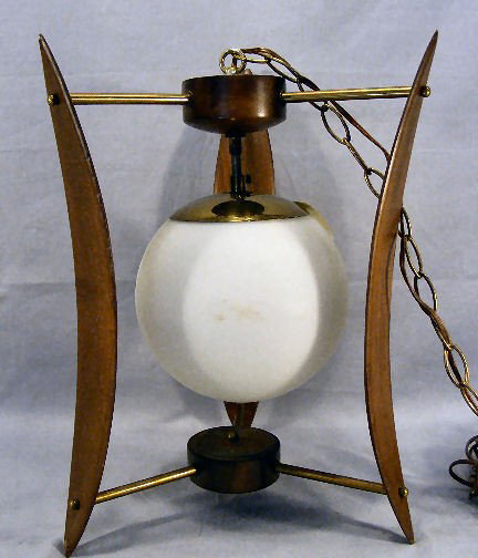 Modern styled hanging light fixture walnut or teak: Modern styled hanging light fixture walnut or teak and brass, 17.5" high, 12.5" wide, chip on bottom on one wood panel