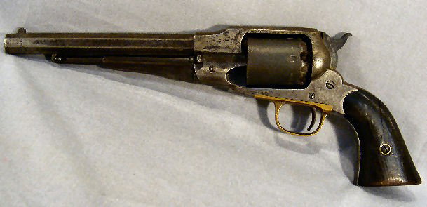 Remington Civil War revolver marked "Patented Sep: Remington Civil War revolver marked "Patented Sept. 14, 1858 Remington & Sons Ilion, New York USA New Model". Allover pitting to frame and barrel, mechanically working except it releases in half cocke