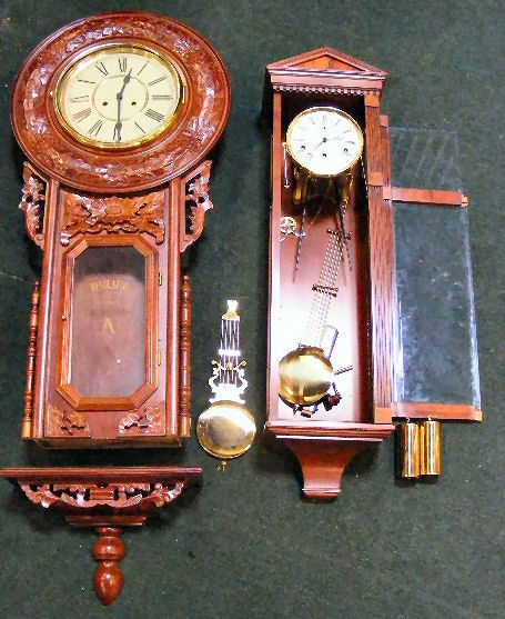 2 wall clocks, (1) Ethan Allen, both are parts cl: 2 wall clocks, (1) Ethan Allen, both are parts clocks, sold as is.