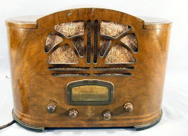 Emerson inlaid veneer radio, stamped on bottom "Ma: Emerson inlaid veneer radio, stamped on bottom "Made in USA 107", very miner veneer damage, old cord - has not been tested, 15" wide, 10.5" high.