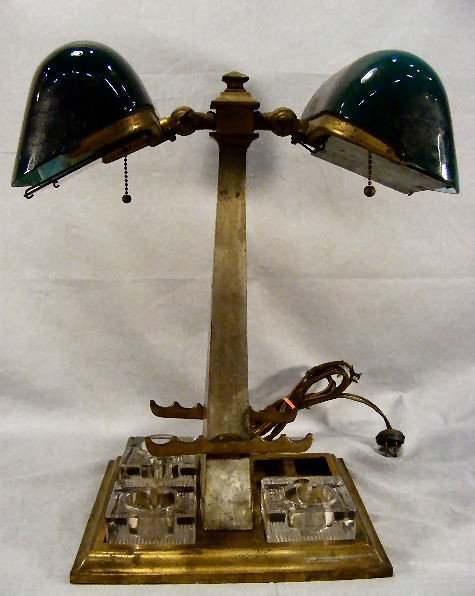 Unusual Emeralite partners desk lamp, brass finish: Unusual Emeralite partners desk lamp, brass finish worn on post, small chip on edge of one shade, one glass section missing. Measures 17" high, base measures 9" X 10"