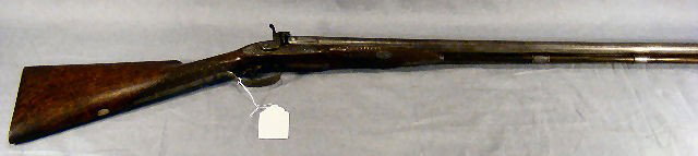 Moore and Harris, London, percussion shotgun. Dou: Moore and Harris, London, percussion shotgun. Double barrel, laminated steel barrel. Engraved locks & trigger guard. 46" long. Mechanically sound. # 05399.
