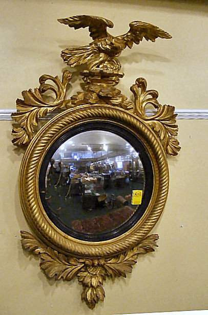 Antique gilt Federal style Bullseye mirror, eagle: Antique gilt Federal style Bullseye mirror, eagle crest. Measures 40" x 23". Good condition.