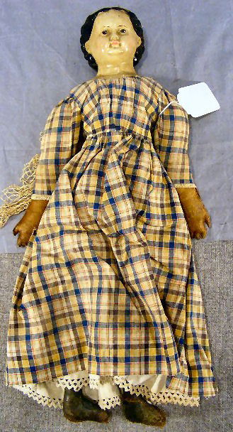 Greiner doll with missing label, 21" long, leathe: Greiner doll with missing label, 21" long, leather arms and feet, splits on seams and cracks on boots