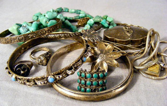 Sterling jewelry lot. Bangles, rings, pill box, l: Sterling jewelry lot. Bangles, rings, pill box, leaf pin, necklace, stick pin & turquoise necklace with silver clasp. 4.59 ozt (weight does not include turquoise necklace).