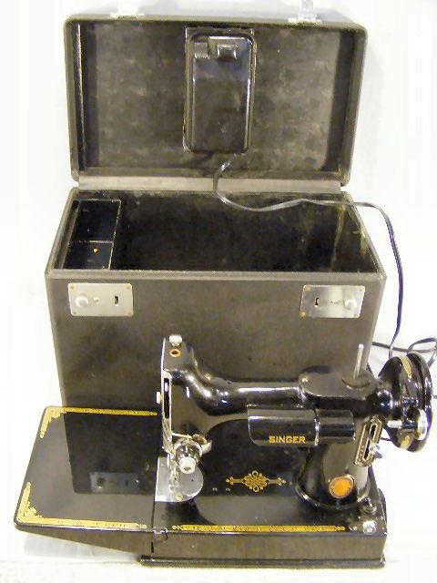 Singer Featherweight sewing machine, very good cos: Singer Featherweight sewing machine, very good cosmetic condtion, service receipts from 1996, cords & belt good, running, case sturdy