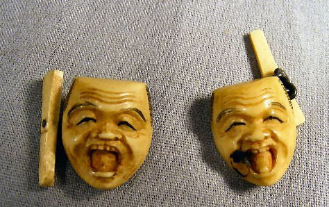 Ivory Asian cufflinks, gentleman faces. .75" long.: Ivory Asian cufflinks, gentleman faces. .75" long. Discoloration on one.