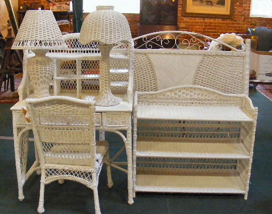 Lot of wicker furniture including two table lamps: Lot of wicker furniture including two table lamps, bookshelf, desk & chair and headboard 60" wide.