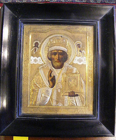 Russian Icon, probably late 19th century, outside: Russian Icon, probably late 19th century, outside frame measurements 8.5" X 6.5". Ebony frame, gilded silver riza. Very good condition.