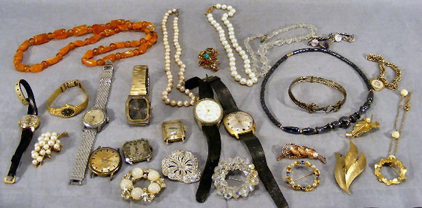 Lot of misc. costume jewelry and wristwatches, bea: Lot of misc. costume jewelry and wristwatches, beads, brooches, bracelets.