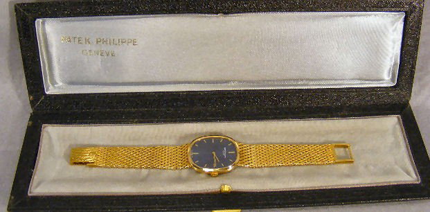 Patek Philippe 18K gold Ellipse wristwatch with 1: Patek Philippe 18K gold Ellipse wristwatch with 18K gold band. Excellent condition, 74.3 grams total weight, 7" band.
